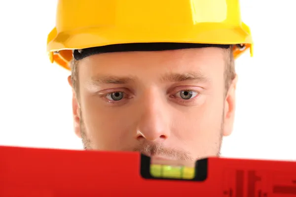 Retrato de joven constructor aislado en blanco — Foto de Stock