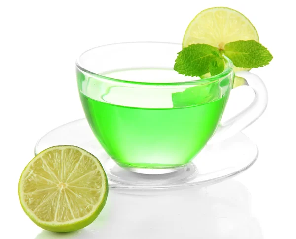Transparent cup of green tea and lime isolated on white — Stock Photo, Image