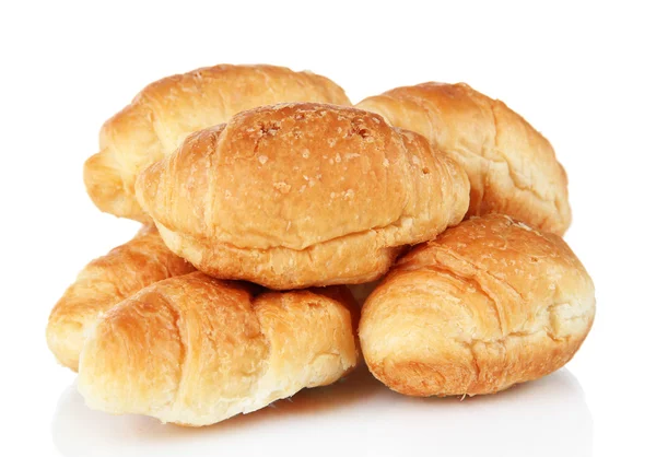 Smakelijke croissants geïsoleerd op wit — Stockfoto