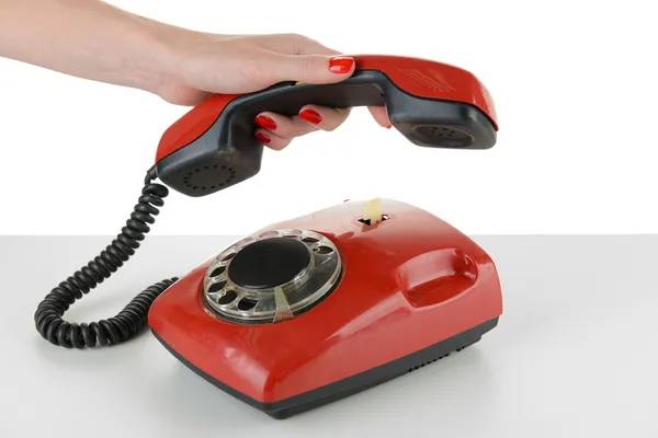 Red retro telephone, isolated on white — Stock Photo, Image