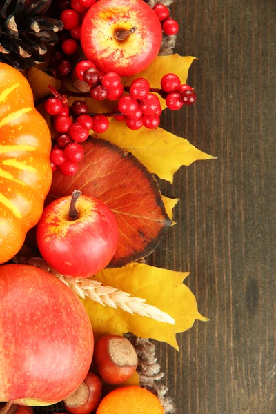 Beautiful autumn composition, on wooden background — Stock Photo, Image