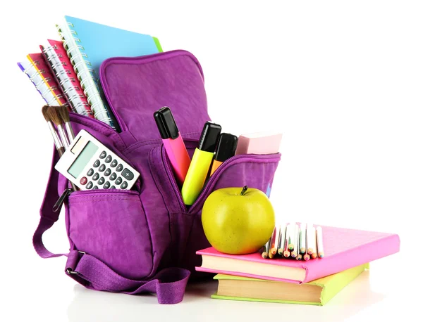 白に隔離された学校用品と紫のバックパック — ストック写真