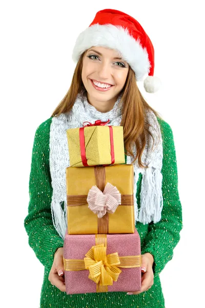 Hermosa chica sonriente en sombrero de Año Nuevo con regalos aislados en blanco —  Fotos de Stock