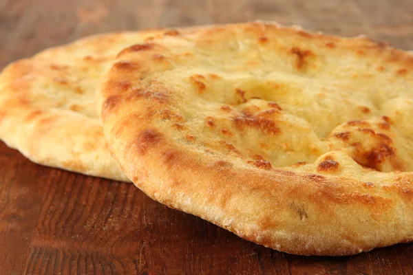 Pane pita su sfondo di legno — Foto Stock