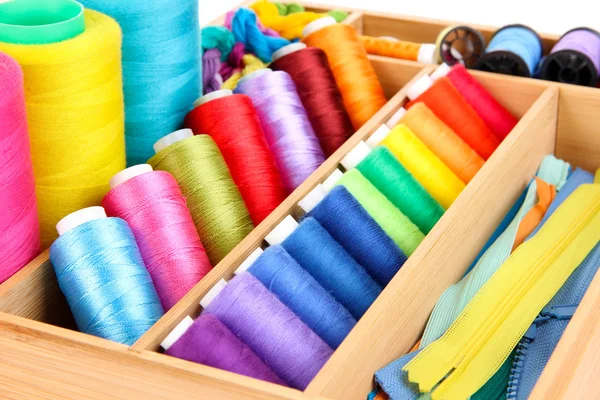 Sewing accessories in wooden box close up — Stock Photo, Image