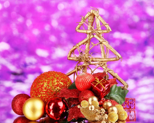 Christmas balls on purple background — Stock Photo, Image