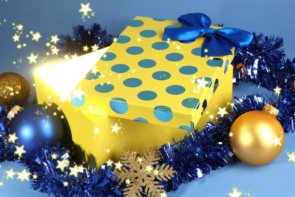 Gift box with bright light — Stock Photo, Image