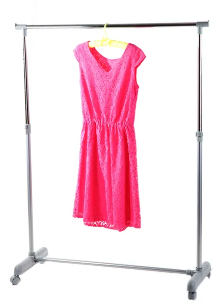 Roze jurk opknoping op hangers — Stockfoto