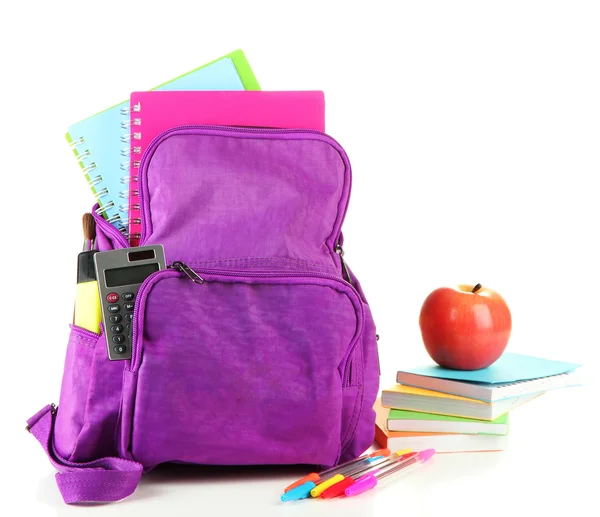 Mochila púrpura con útiles escolares — Foto de Stock