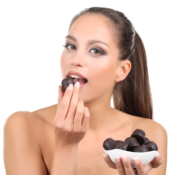 Mooi meisje met chocolade snoepjes — Stockfoto
