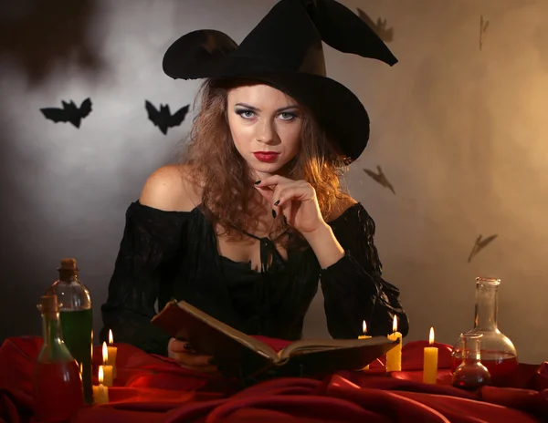 Halloween witch on dark background — Stock Photo, Image