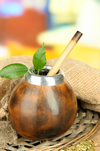 Calabash and bombilla with yerba mate on wooden table — Stock Photo, Image