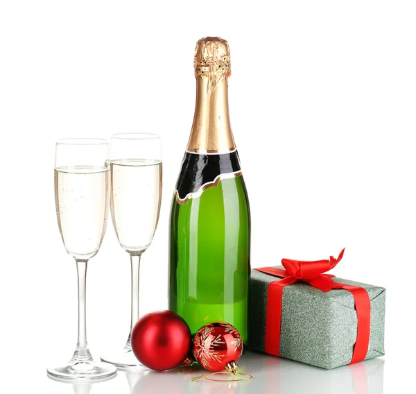 Bottle of champagne with glasses and Christmas balls isolated on white — Stock Photo, Image