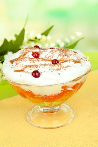 Tasty jelly in bowl on table on light background — Stock Photo, Image