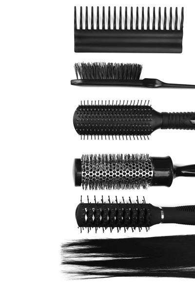 Black combs isolated on white — Stock Photo, Image