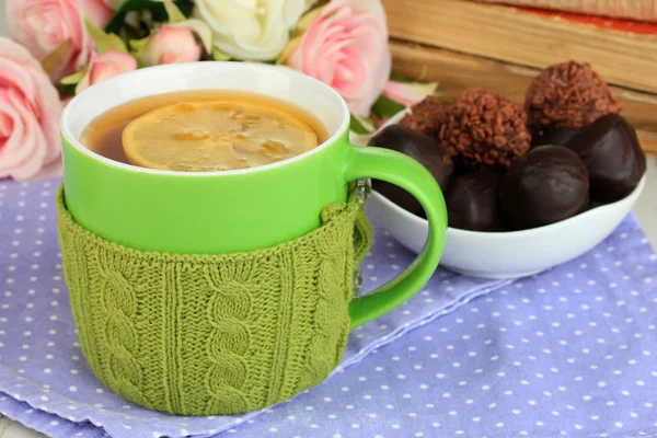 Cup with knitted thing on it close up — Stock Photo, Image