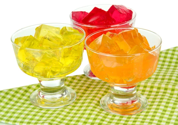Tasty jelly cubes in bowls on table — Stock Photo, Image
