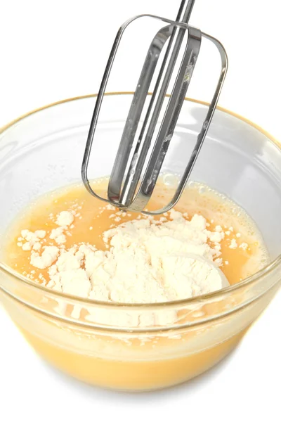 Cooking, whipping eggs with electric whisk in bowl, close up — Stock Photo, Image