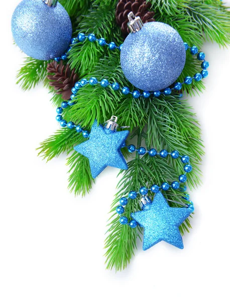 Christmas balls and decorative stars on fir tree, isolated on white — Stock Photo, Image