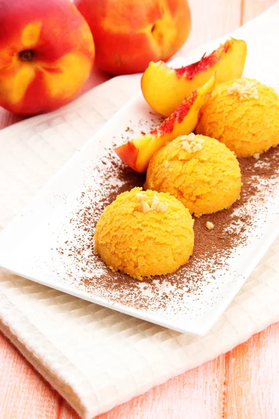 Delicious ice cream on plate on table close-up — Stock Photo, Image