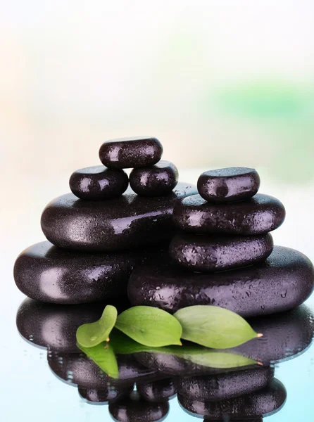 Spa stones on bright background — Stock Photo, Image