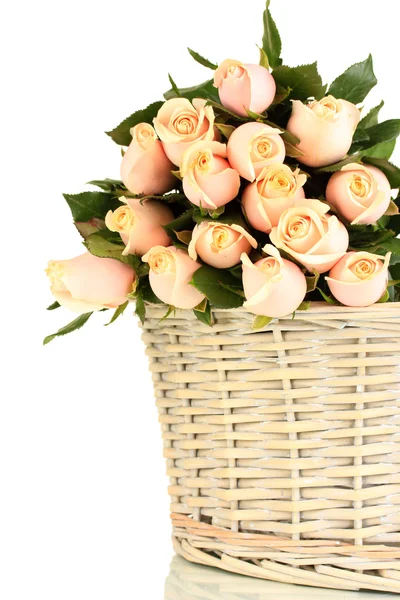 Beautiful bouquet of roses in basket, isolated on white — Stock Photo, Image