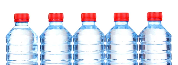 Plastic bottles of water isolated on white — Stock Photo, Image