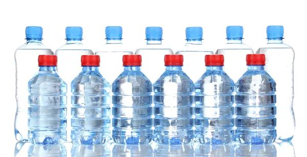 Plastic bottles of water isolated on white — Stockfoto