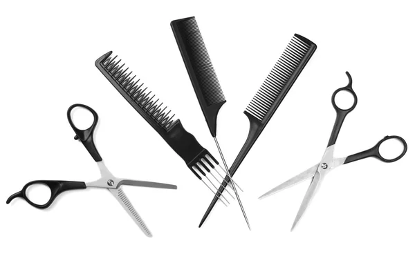 Outils professionnels de coiffeur isolés sur blanc — Photo