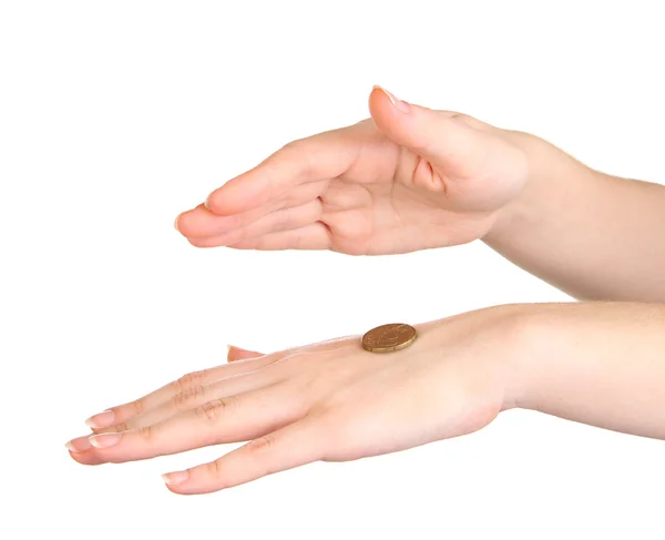 Руки женщины, бросающей монету изолированы на белом — стоковое фото