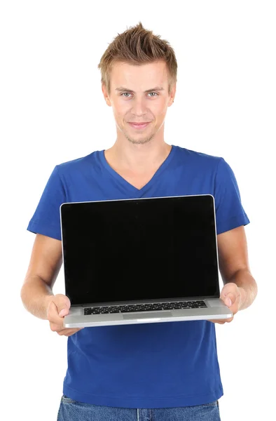Przystojny, młody człowiek z laptopa na białym tle — Zdjęcie stockowe