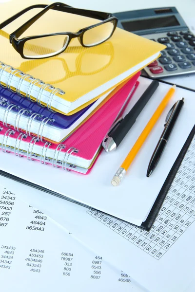 Office supplies with glasses and documents close up — Stock Photo, Image
