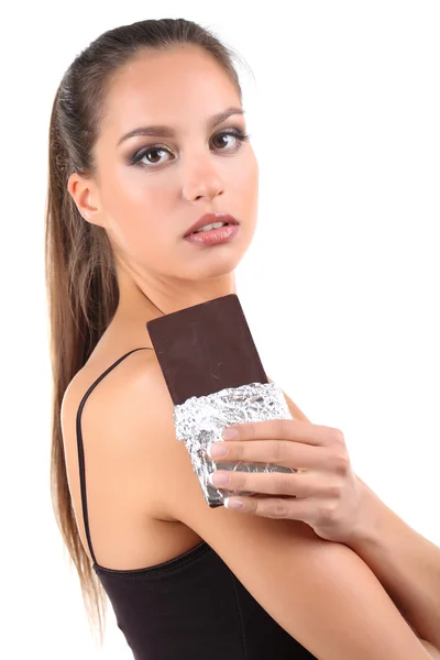 Portrait of beautiful young girl with chocolate isolated on white — Stock Photo, Image