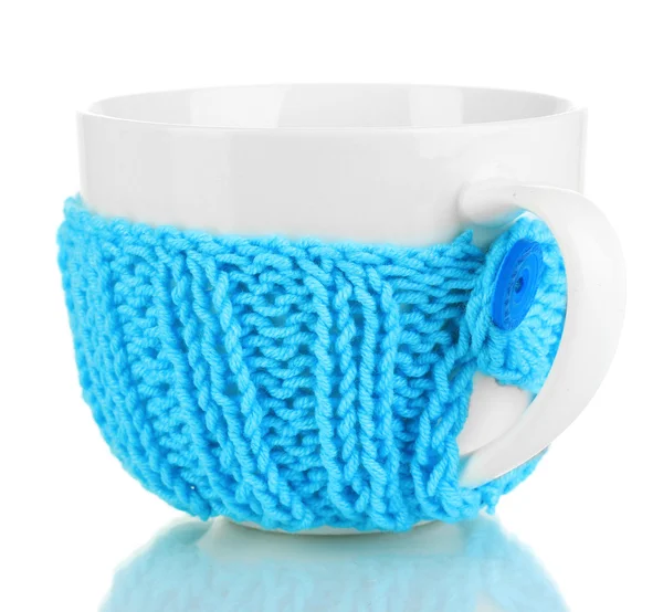 Cup with knitted thing on it isolated on white — Stock Photo, Image