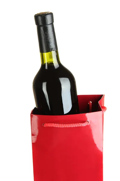 Confezione regalo con vino isolato su bianco — Foto Stock