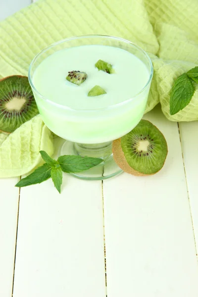 Delicious yogurt with fruit on table close-up — Stock Photo, Image