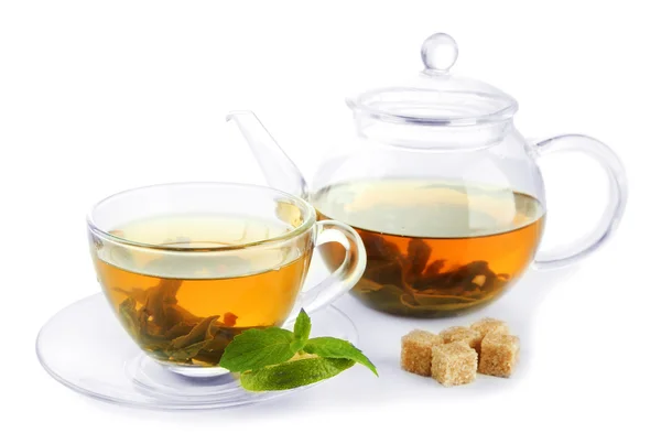 Cup and teapot of green tea with mint and sugar isolated on white — Stock Photo, Image