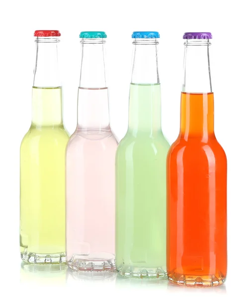 Напитки в стеклянных бутылках, изолированных на белый — стоковое фото