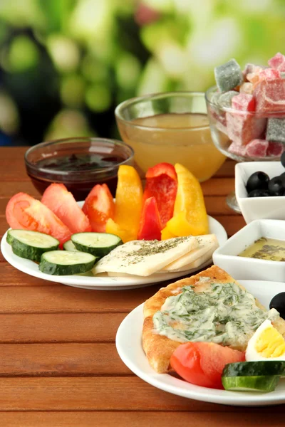 Traditional Turkish breakfast on table on bright background — Stock Photo, Image