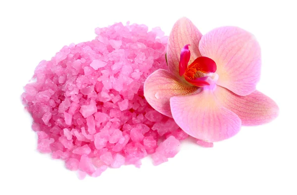 Beautiful blooming orchid flower and heap of sea salt, isolated on white — Stock Photo, Image