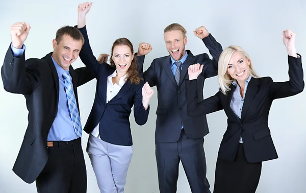 Group of business people on gray background Stock Image