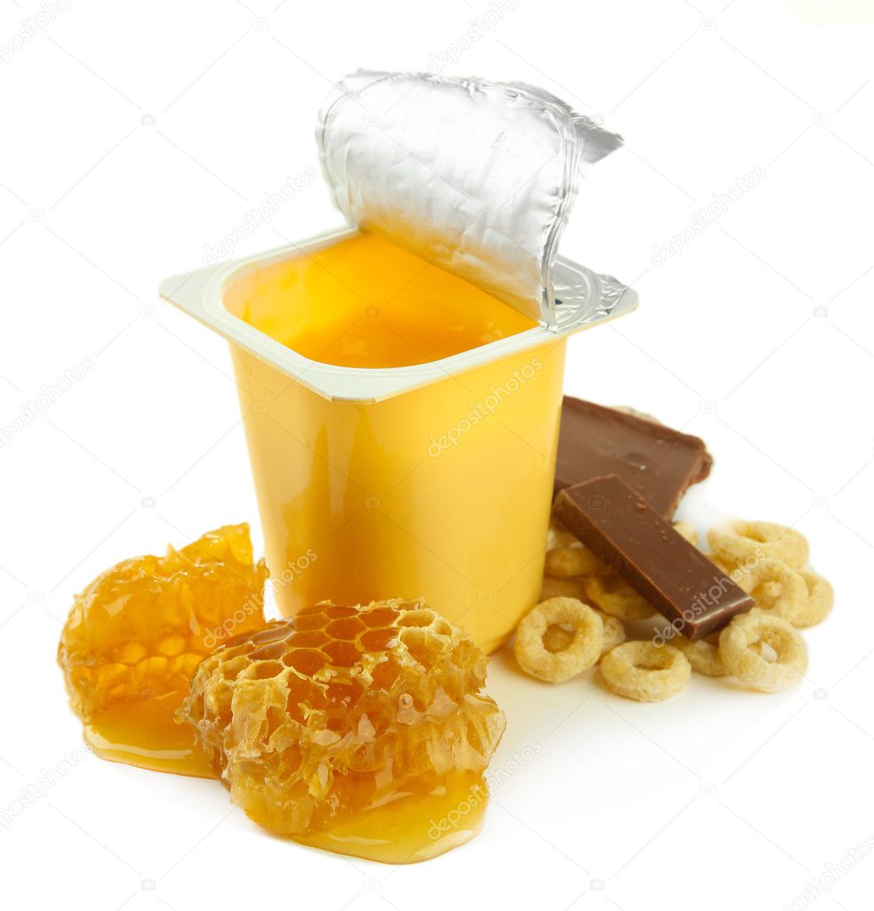 Tasty dessert in open plastic cup and honey combs, isolated on white