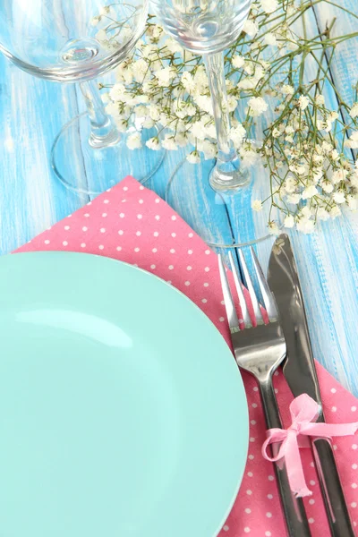 Table serving on a wooden background — Stock Photo, Image