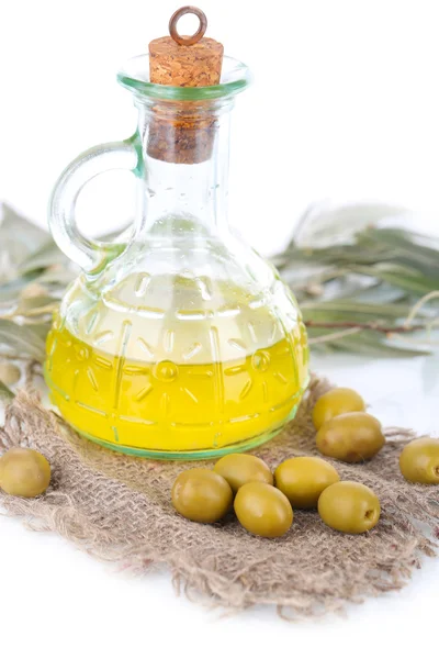 Huile d'olive et branche sur sac isolé sur blanc — Photo