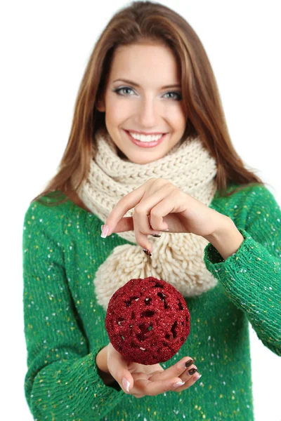 Hermosa chica sonriente con juguete de Navidad aislado en blanco —  Fotos de Stock