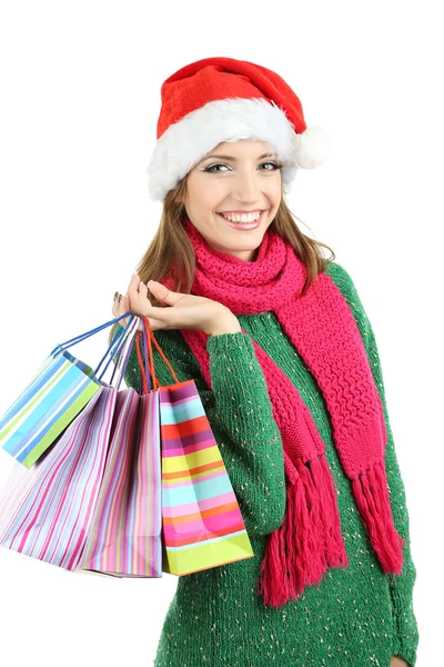 Hermosa chica sonriente con bolsas de regalo aisladas en blanco — Foto de Stock