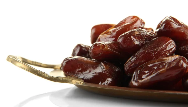 Dates séchées sur plateau métallique isolé sur blanc — Photo