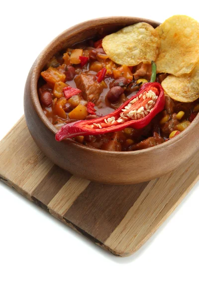Chili Corn Carne - traditional mexican food, in wooden bowl, on wooden board, isolated on white — Stock Photo, Image