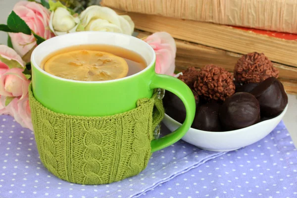 Cup with knitted thing on it close up — Stock Photo, Image