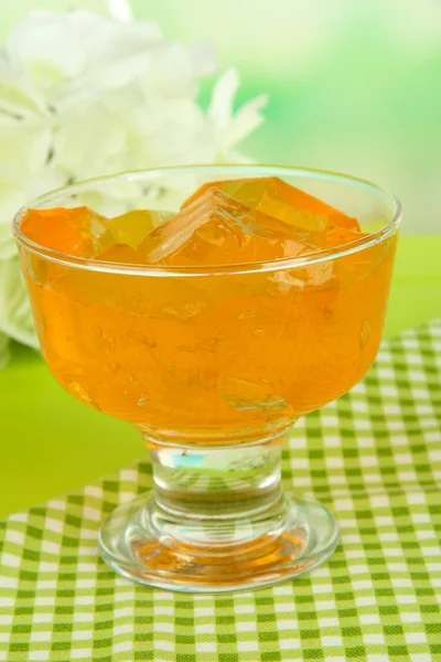 Tasty jelly cubes in bowl on table on light background — Stock Photo, Image